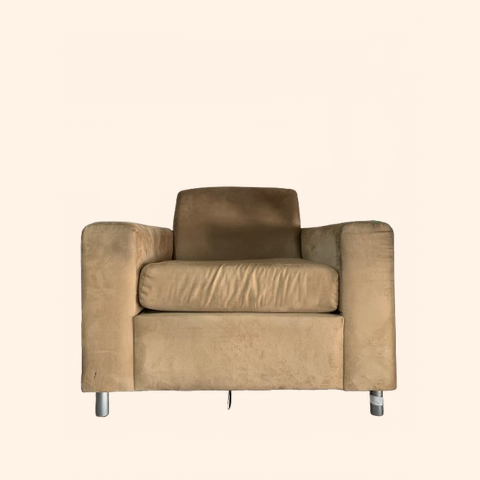 Brown upholstered armchair with metal legs.