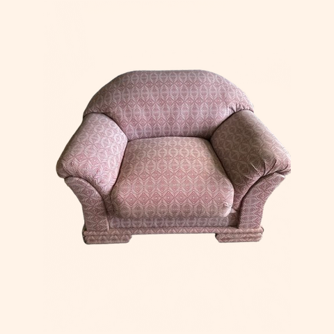 Cushioned loveseat with a floral pattern.