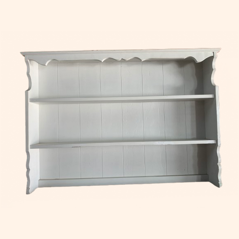 White wooden shelving unit with three open shelves.