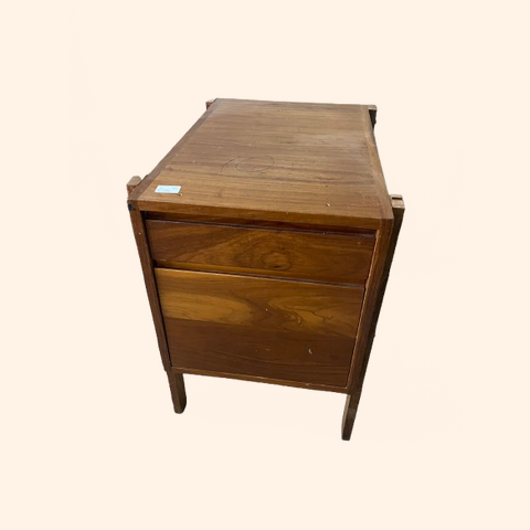 Wooden side table with two drawers and a smooth top.