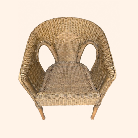 Woven rattan chair with curved back and armrests.